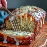 Slices of fragrant lemon lavender cake with honey glaze, showcasing a tender crumb and delicate floral aroma, perfect for afternoon tea or dessert.