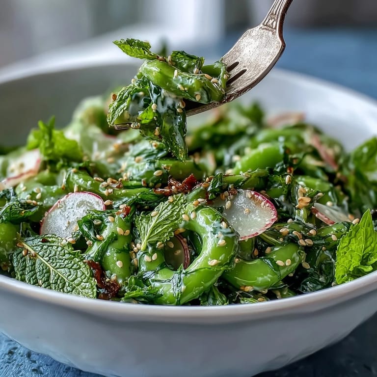 Crisp, colorful Snap Pea and Radish Spring Salad brightened by fresh herbs.